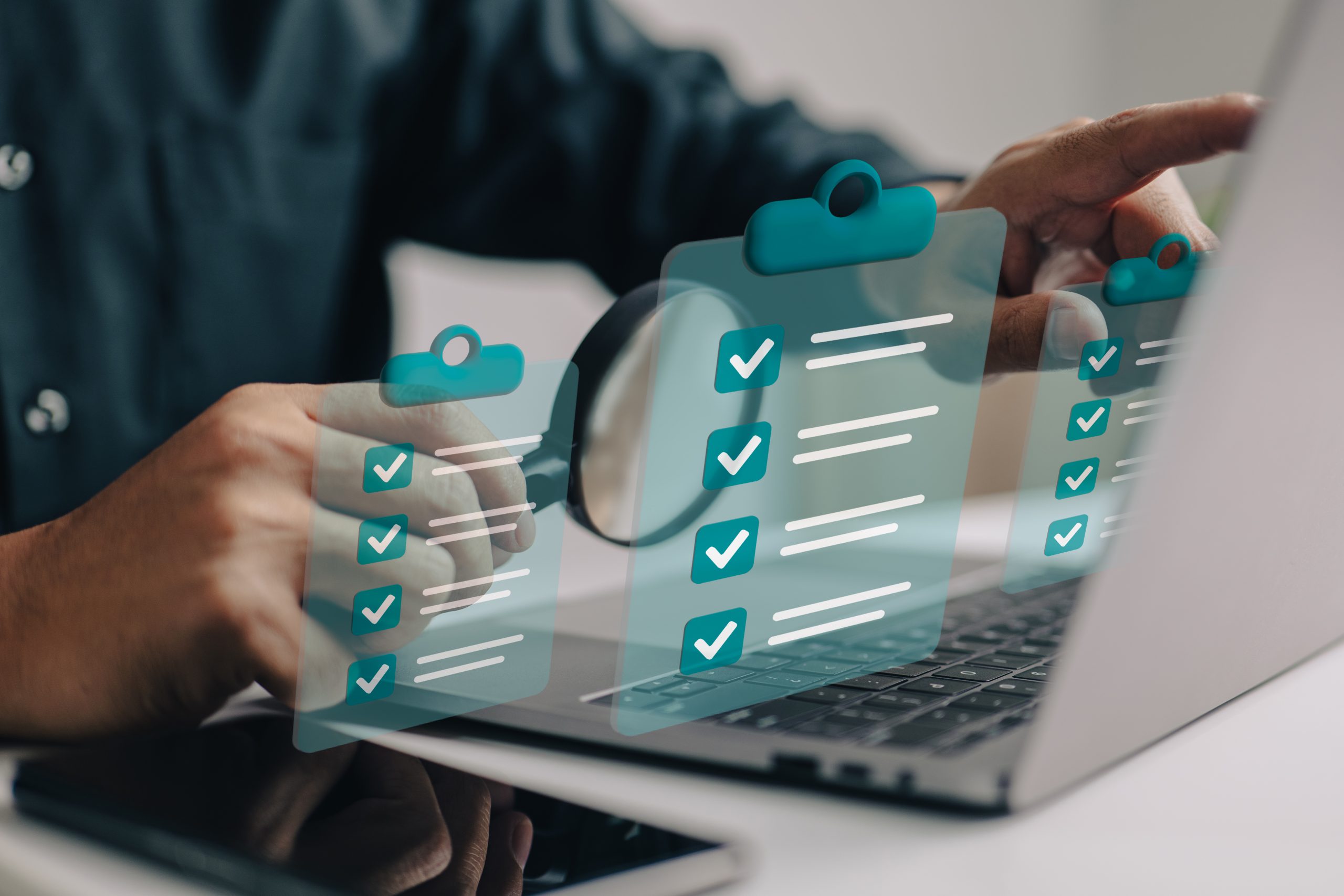 Businessman use magnifying glass with a checklist on clipboard paper. Successfully complete business assignments.