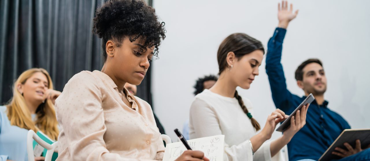 https://swiftfp.com/wp-content/uploads/2022/08/group-young-people-sitting-conference-together-while-raising-their-hands-ask-question-business-team-meeting-seminar-training-concept-copy-1280x557.jpg