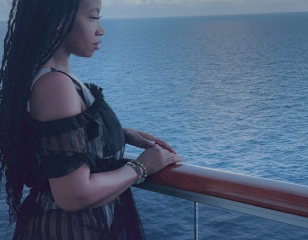 Beautiful black woman on cruise ship.